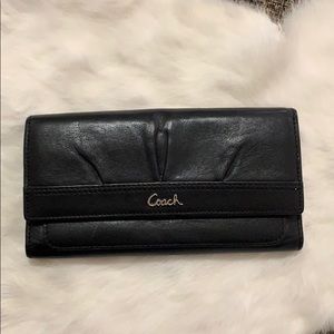 Like NWOT Authentic Coach black leather wallet.